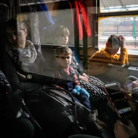 People fleeing Ukraine travel on a humanitarian train organized by the Slovak Rail Company
