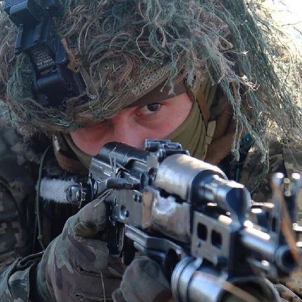 A service member of the Ukrainian Air Assault Forces takes part in tactical drills at a training ground