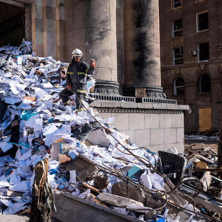 Firefighters continue to clear rubble from the damaged administration building of Kharkiv